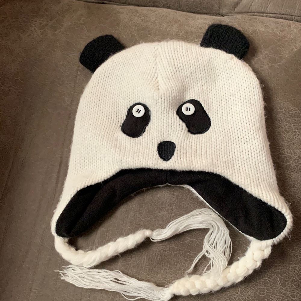 Panda beanie with tassels.  One size fits most.
